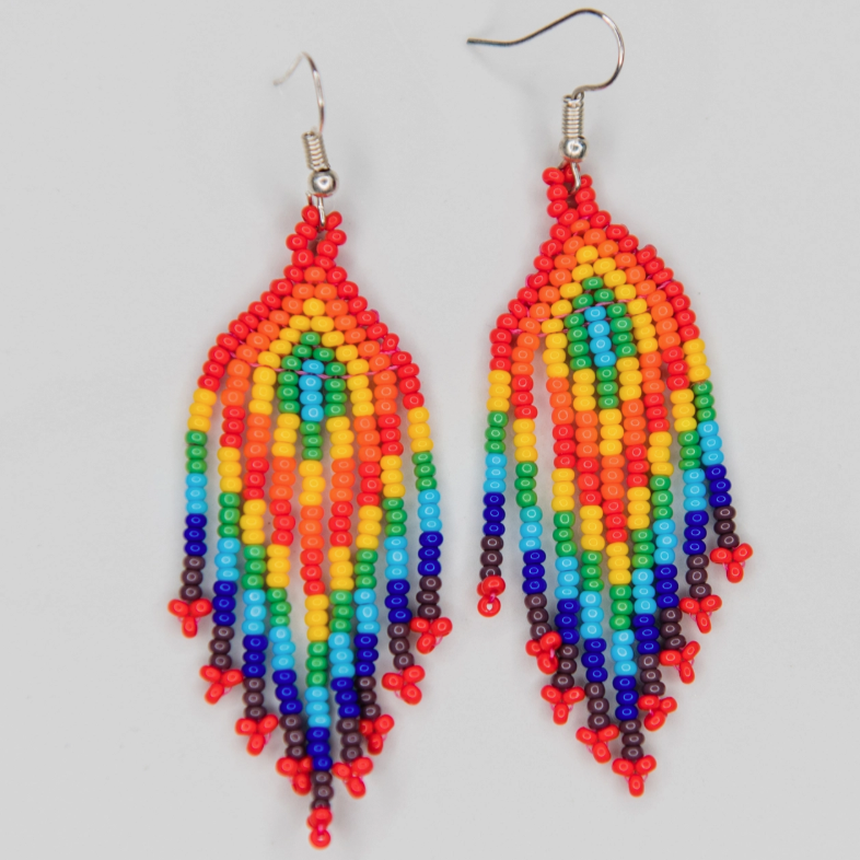 Colorful beaded earrings on a light gray background