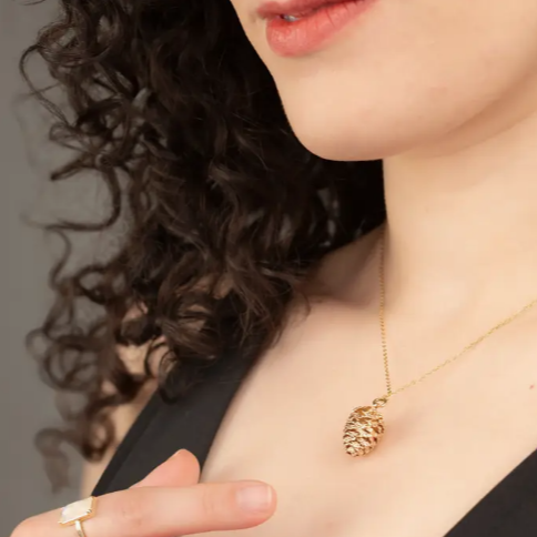 Abundant Hope Pinecone Necklace model