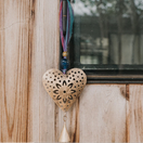 Switch Chakshu Heart Sari Bell hanging on window 2 image