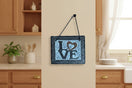 Switch Decorative sign with 'LOVE' text and heart symbol hanging on a kitchen wall 3 image