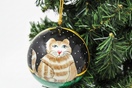 Switch Close up detail shot of handpainted paper mache cat ornament 3 image