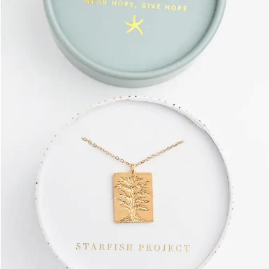 Rooted in love golden tree pendant by Starfish Project