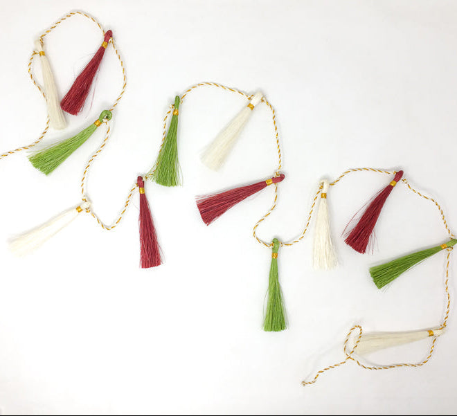 garlands with tassels on a white background