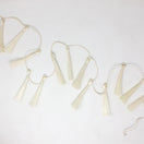 Switch Set of white tassel garlands on a white background 3 image