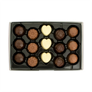 Switch Box of assorted chocolates with different shapes and colors on a white background 2 image