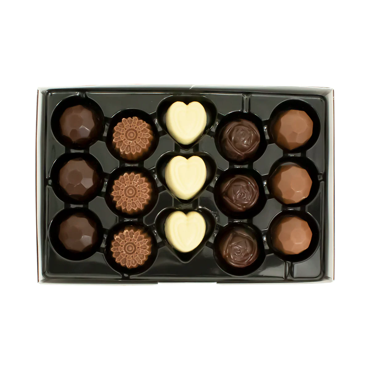 Box of assorted chocolates with different shapes and colors on a white background