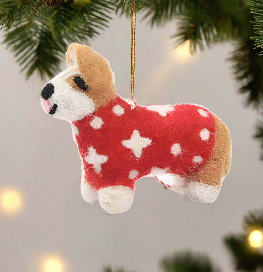 A handmade Welsh dog wearing a sweater tree ornament