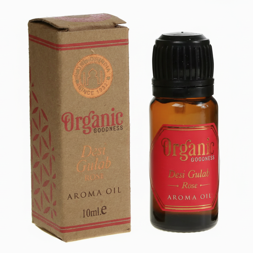 Bottle and box of Organic Goodness Desi Gulab Aroma Oil on a white background