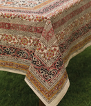Switch Decorative tablecloth with intricate patterns on a green surface 1 image