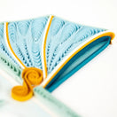 Switch Quilled paper art with blue and yellow colors on a white background 2 image