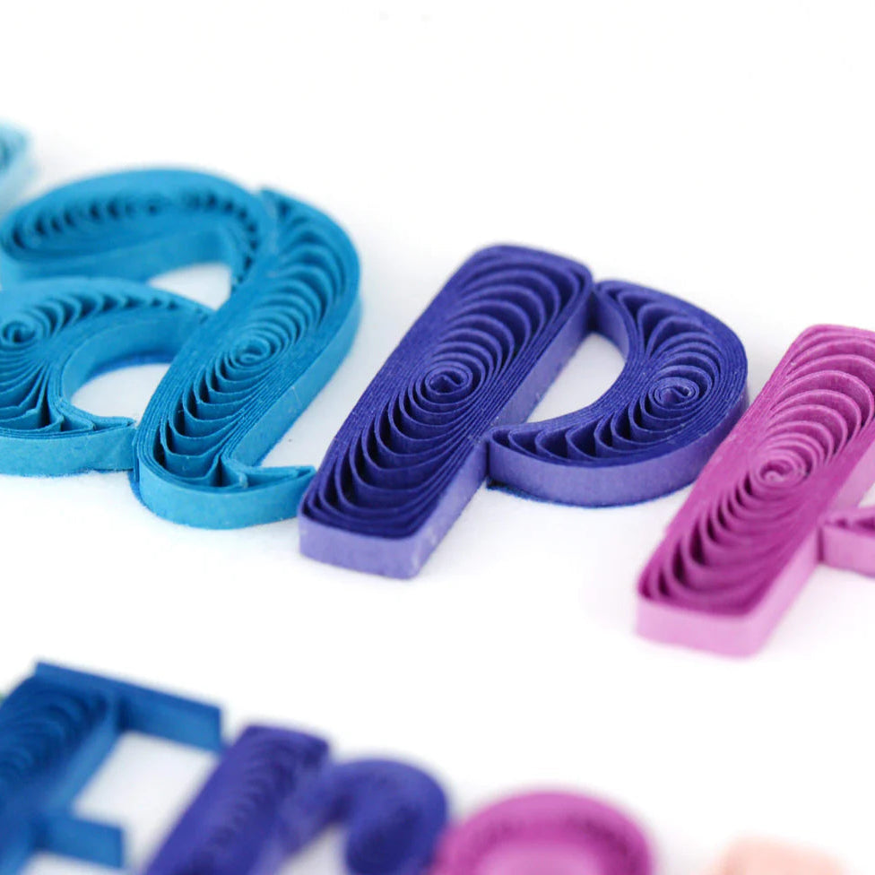 Colorful paper quilling letters on a white background