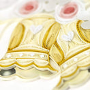 Switch Decorative gold and white card with floral elements on a white background 2 image