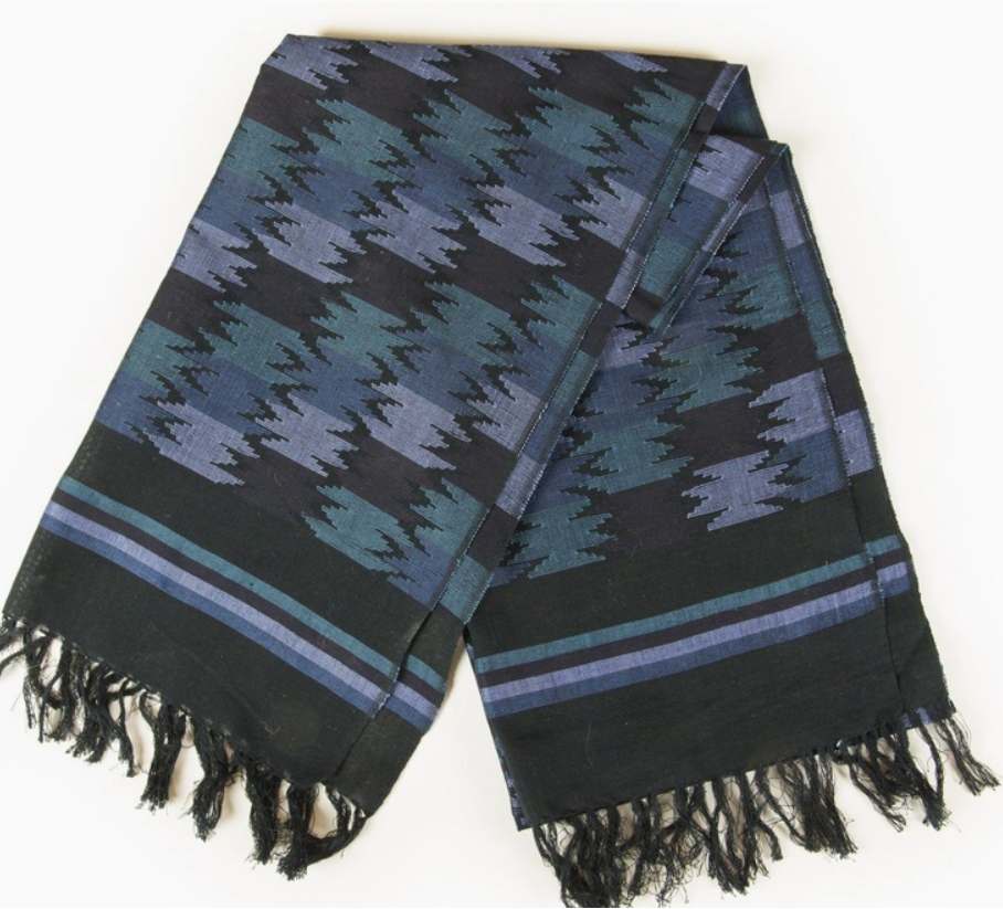 Plaid patterned scarf with fringes on a white background