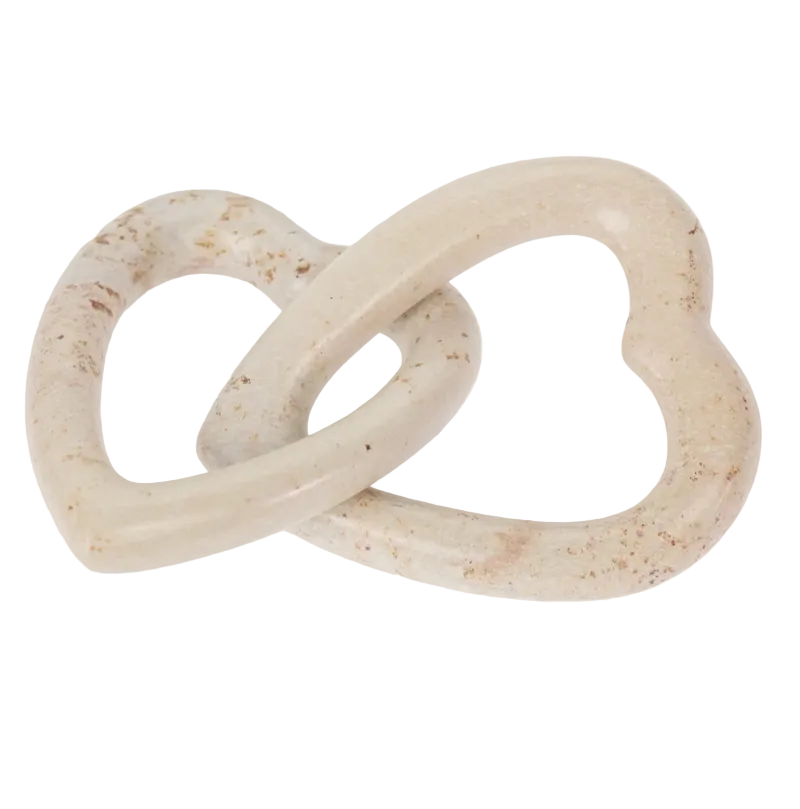 Beige-pink stone hearts on a white background