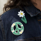 Switch Denim jacket with a peace symbol and flower patch 2 image