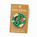 Switch Green peace sign brooch with white flowers on a Matr Boomie packaging card. 3 image