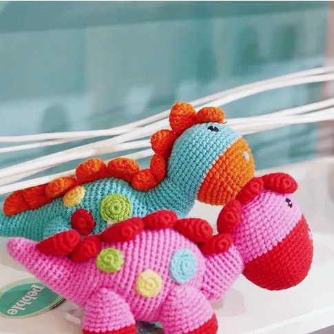 Dinosaur Rattle Steggi Pink