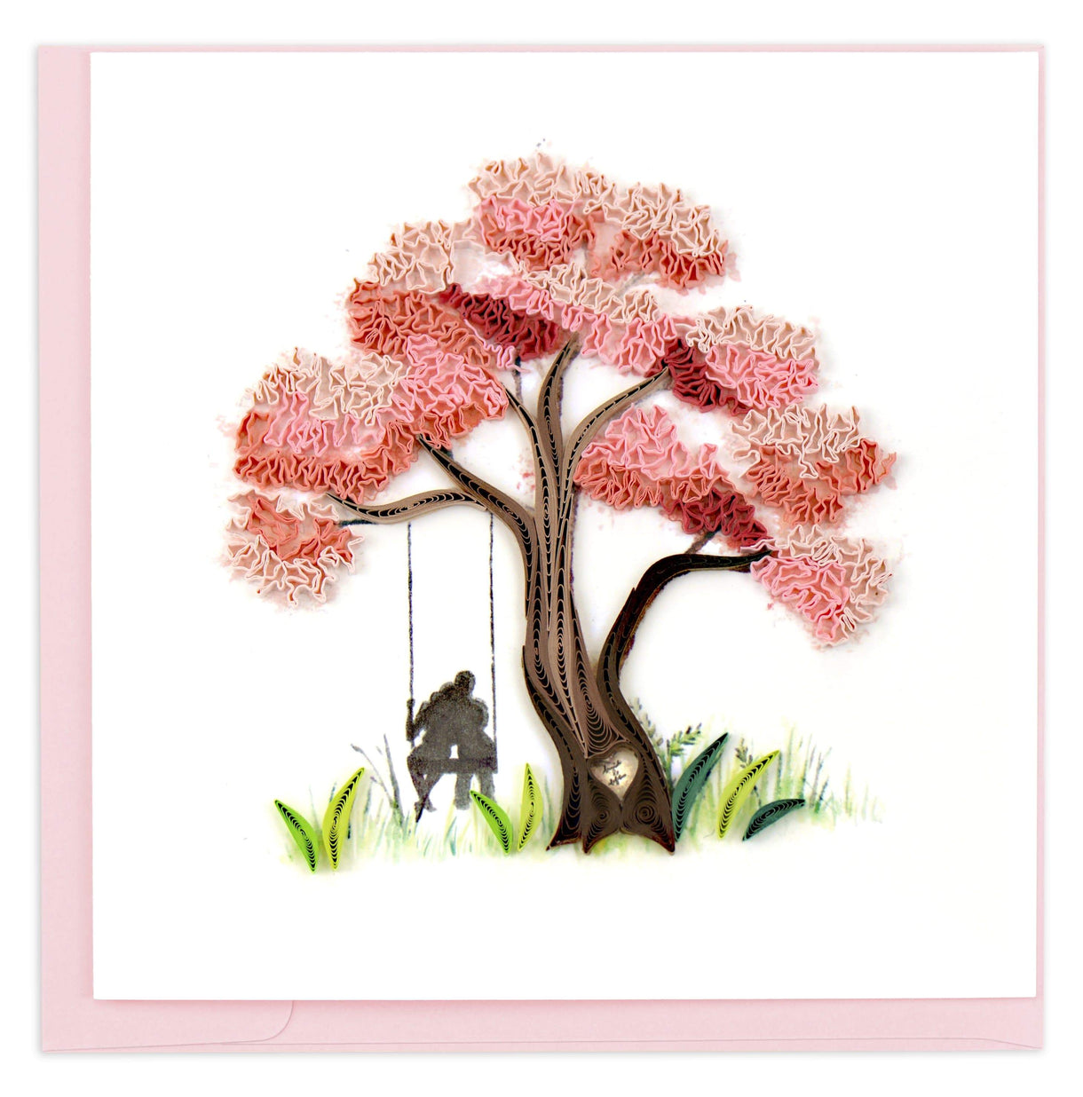 quilled paper greeting card of a tree with pink flowers and two people on a swing.