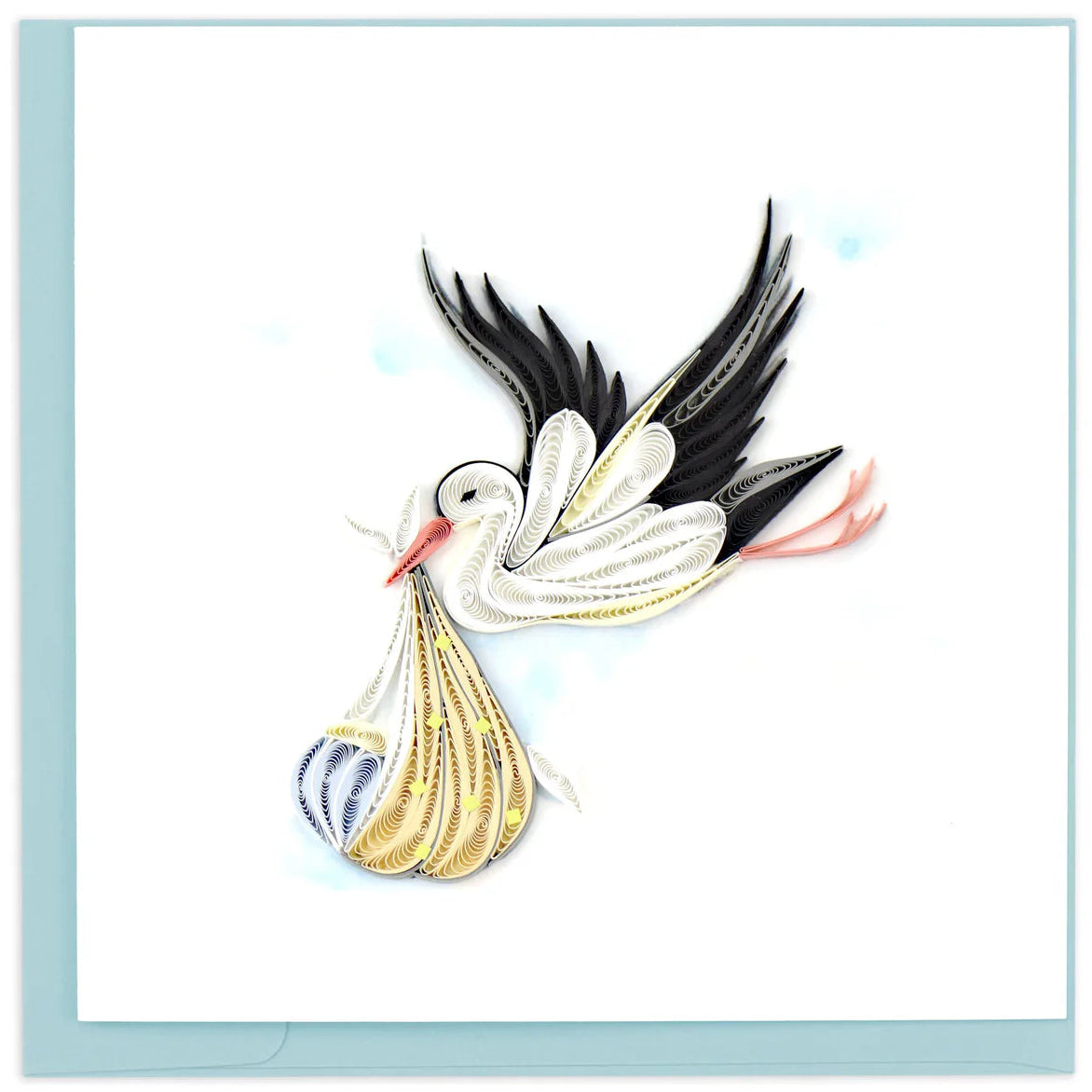 Decorative card with a stork carrying a baby wrapped in a ivory blanket.