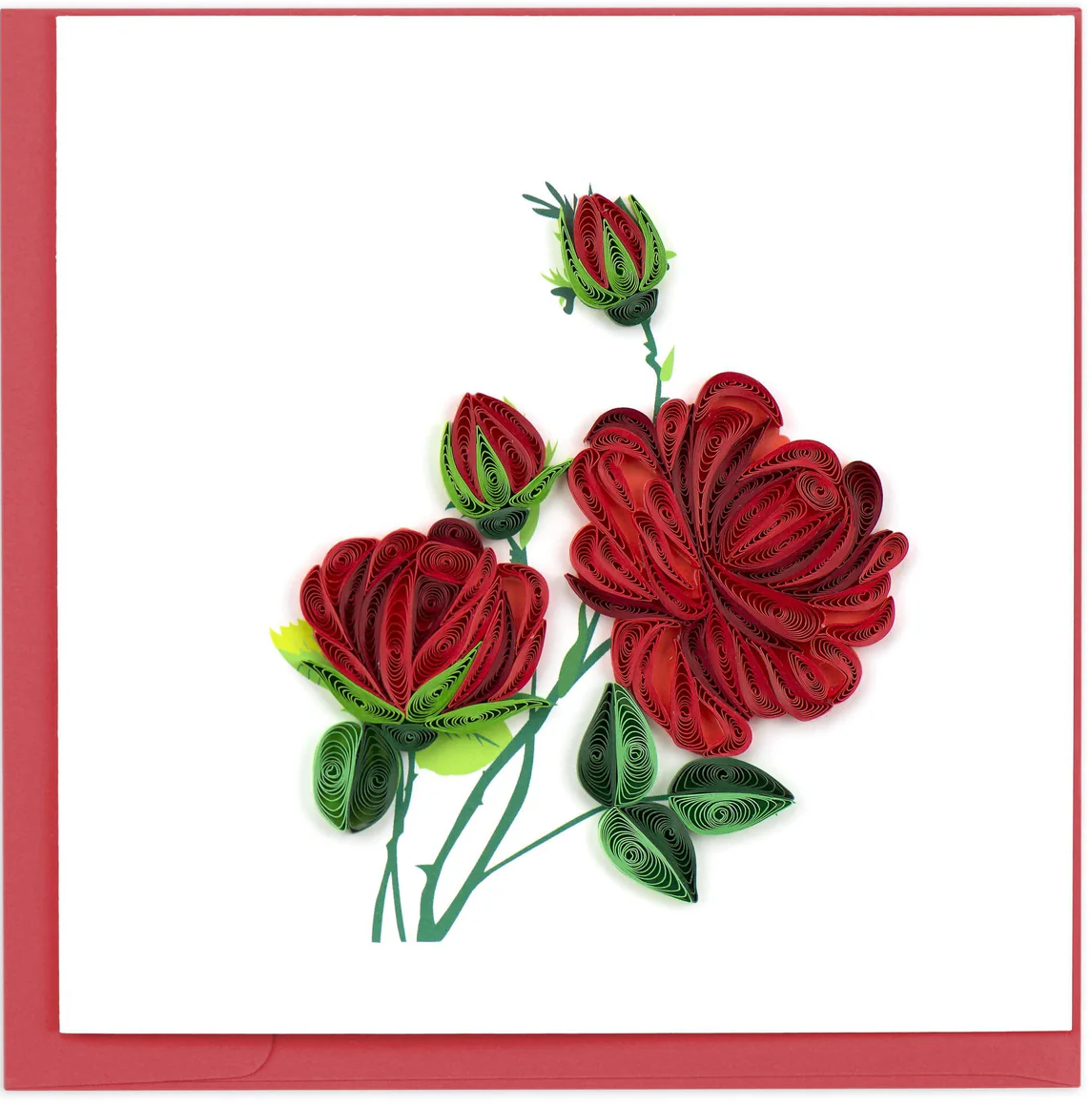 Quilled red roses with green leaves on a white background