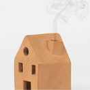 Switch Ceramic house-shaped incense burner with smoke on a white background 2 image
