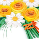 Switch Colourful paper flowers in yellow, orange, and green on a white background 2 image