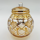 Switch Decorative glass jar with gold patterns on a white background 3 image