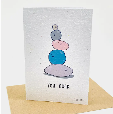 Card with colorful stacked stones illustration and 'You Rock' text on a white background