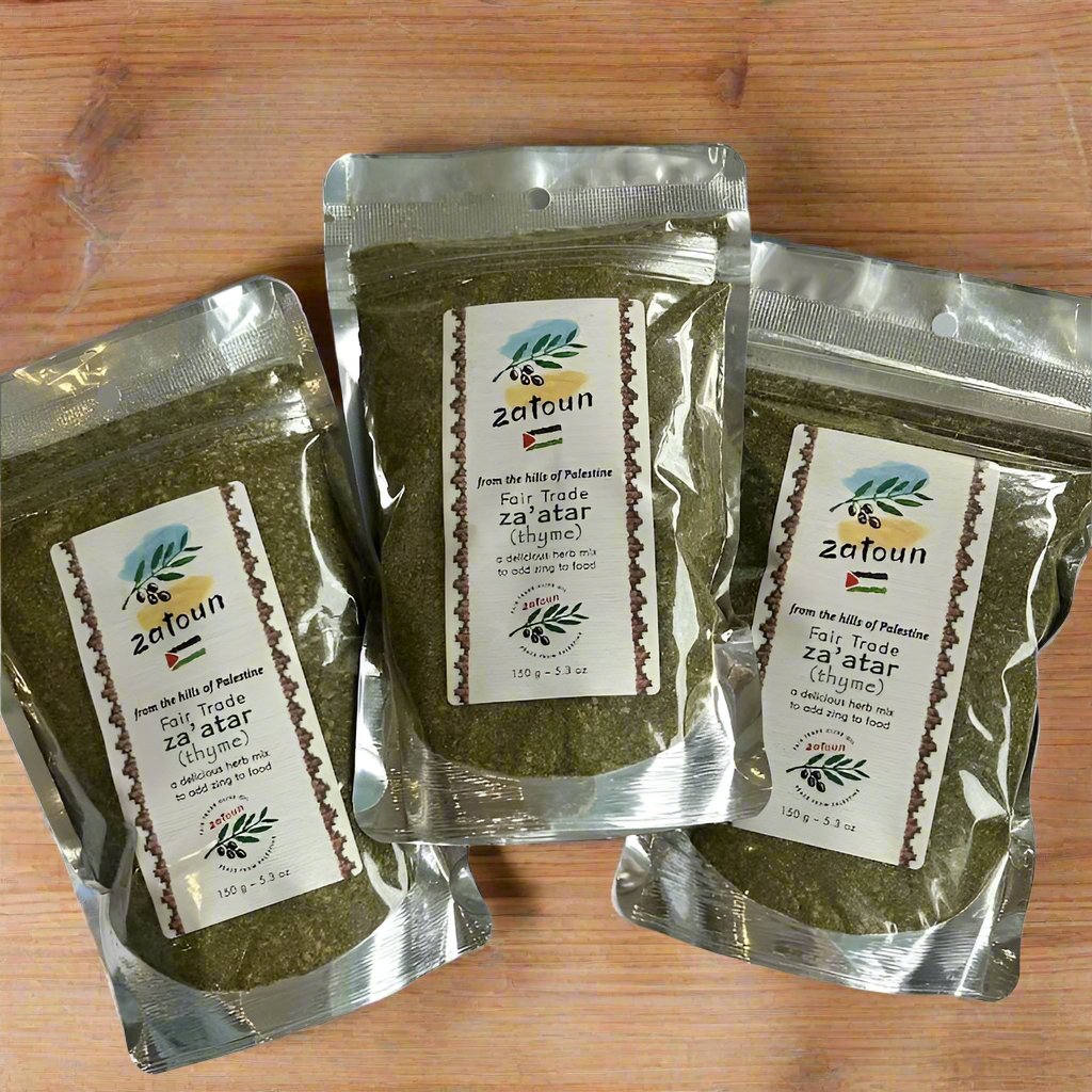 Three packages of Za'atar Thyme Herb Mix by Zatoun, each labeled with the product name and weight (150g), displayed against a white background.